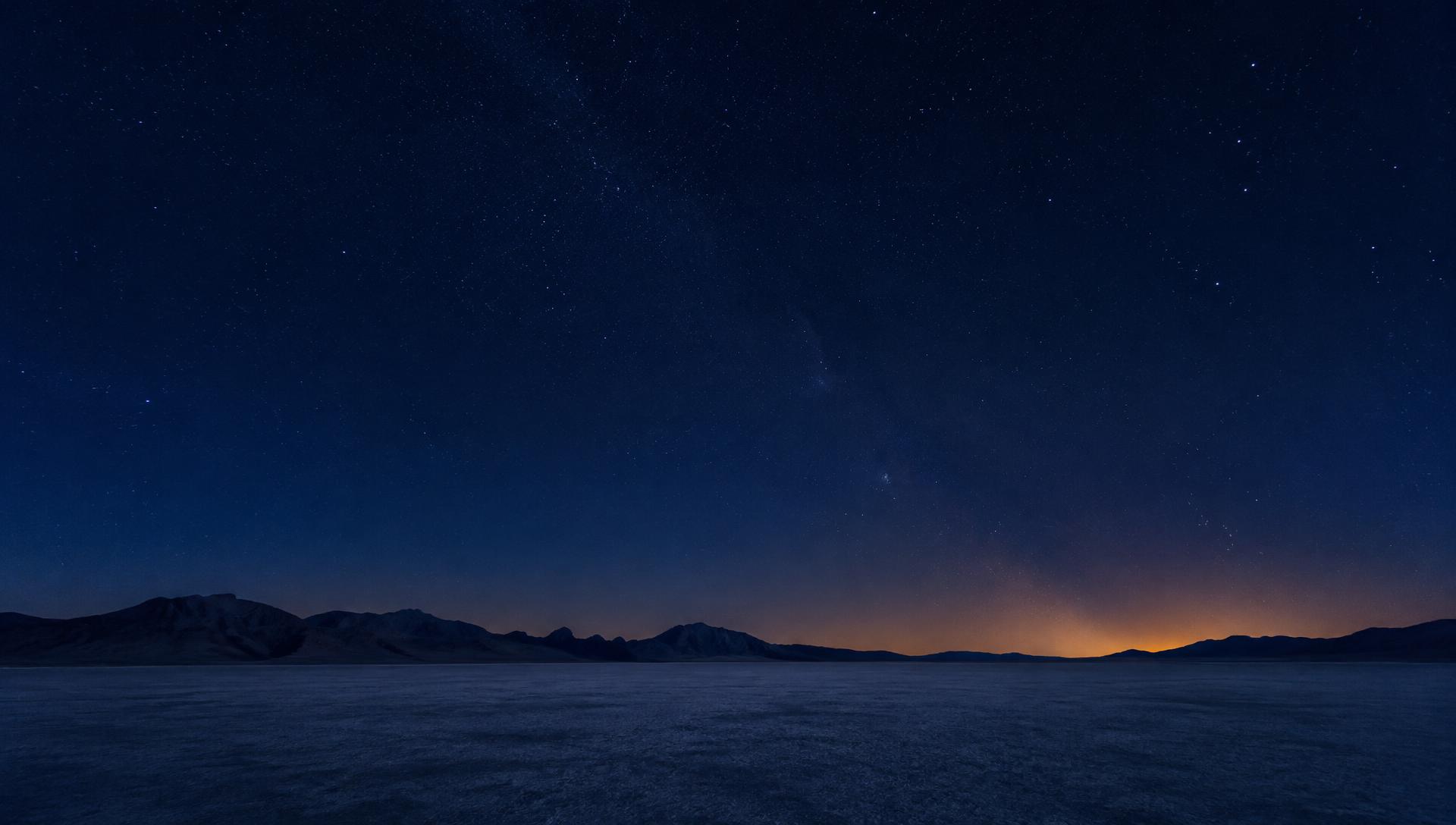 Desert playa under a starry sky